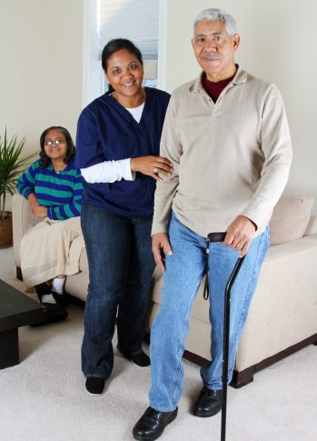 Home Health Care Home health care worker and an elderly couple